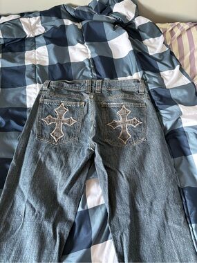 34 (fits 8-10) vision streetwear flared jeans with cross detailing on pockets